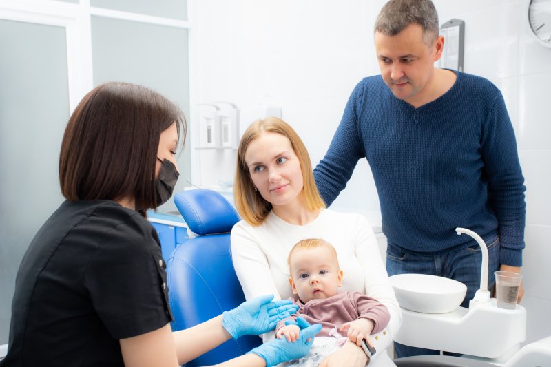 Parents attending their child’s first dental visit